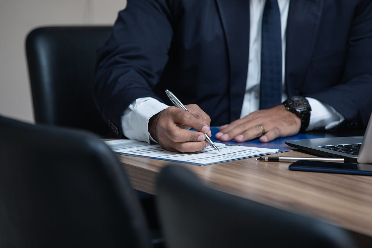 Property lawyer reviewing Spanish legal documents